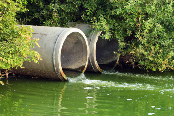 istock Discharge of sewage into a river 1024254384