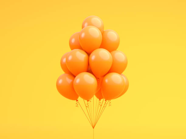 istock Orange balloons floating in Orange 