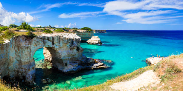 natural landmarks and best beaches of puglia. "torre di sant andrea" near otranto. italy - salento imagens e fotografias de stock