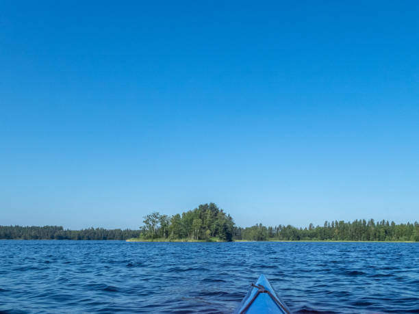 istock Kayaking on the calm Saimaa lake in Finland - 4 1024273864
