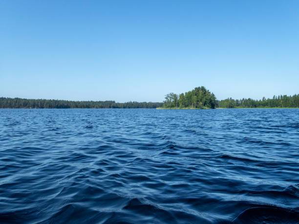 istock Asmall rocky island on the Saimaa lake in Finaland - 1 1024273900