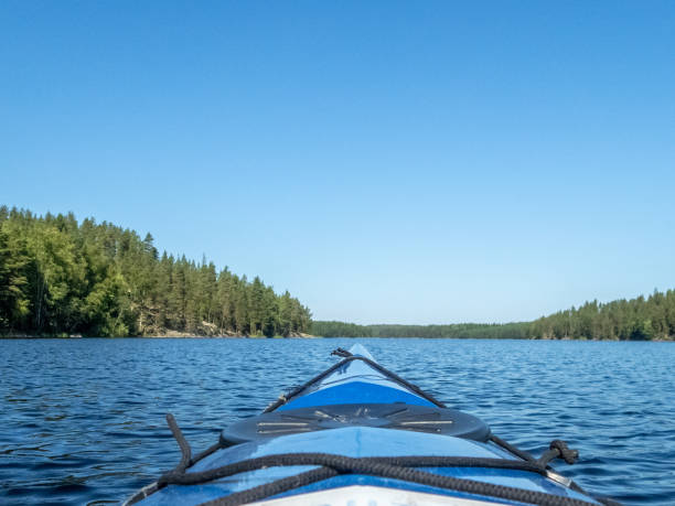 istock Kayaking on the calm Saimaa lake in Finland - 1 1024273990