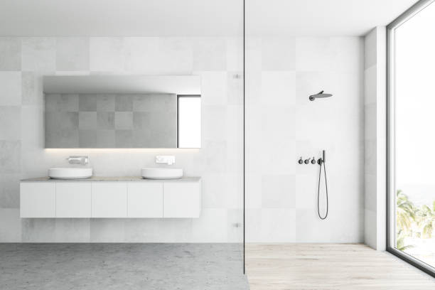 istock White Scandinavian bathroom interior, sink, shower 1024278002