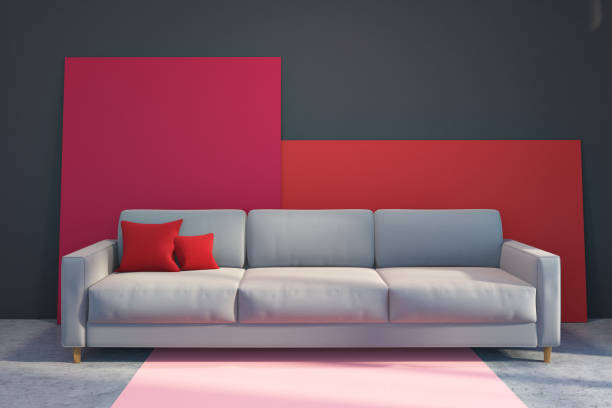istock Gray sofa in a gray and red living room 1024281092