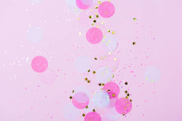 istock Pink confetti and stars and sparkles on pink background. 1024281712