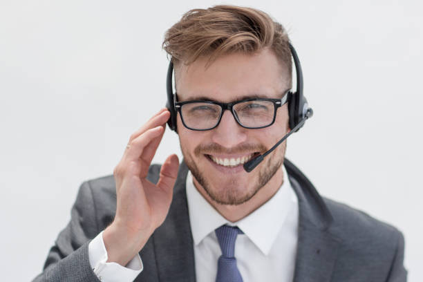 istock close up.smiling call center employee 1024287068