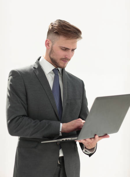 istock close up.businessman examines a new laptop 1024289518