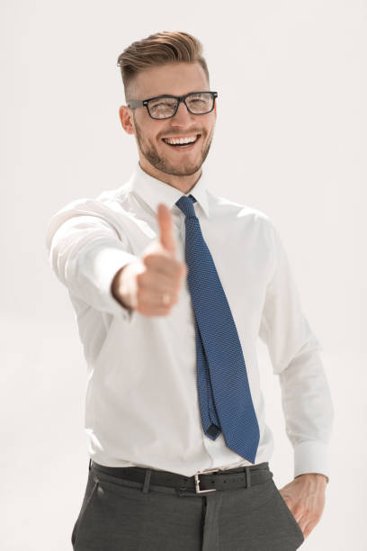 istock close up.successful businessman showing thumb up 1024299456