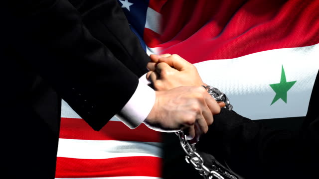 United States sanctions Syria, chained arms, political or economic conflict