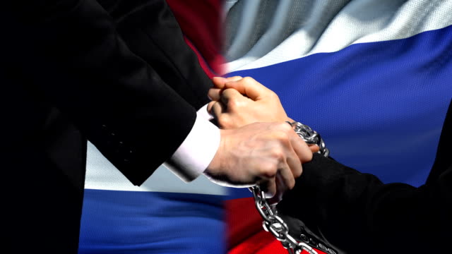 Netherlands sanctions Russia, chained arms, political or economic conflict