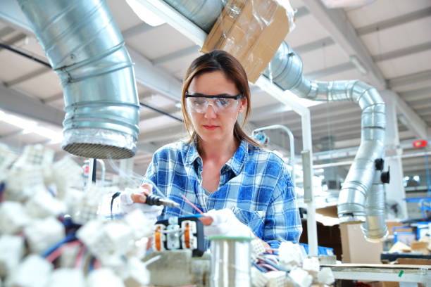 istock Woman working in a factory 1024313670