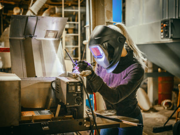istock Female TIG Welder 1024321946