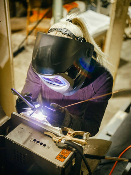 istock Female TIG Welder 1024322008