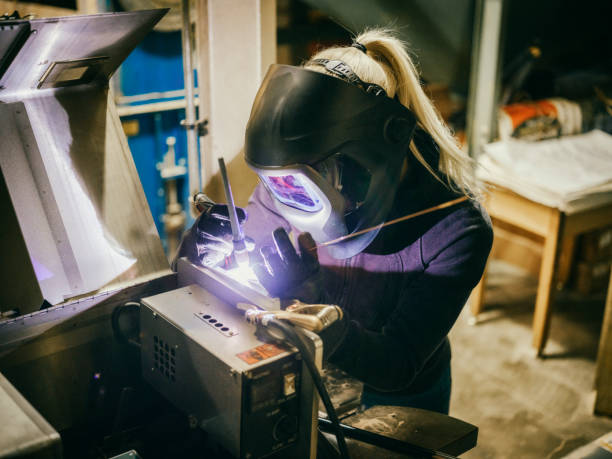istock Female TIG Welder 1024322046