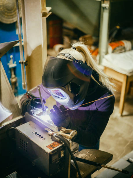 istock Female TIG Welder 1024322072