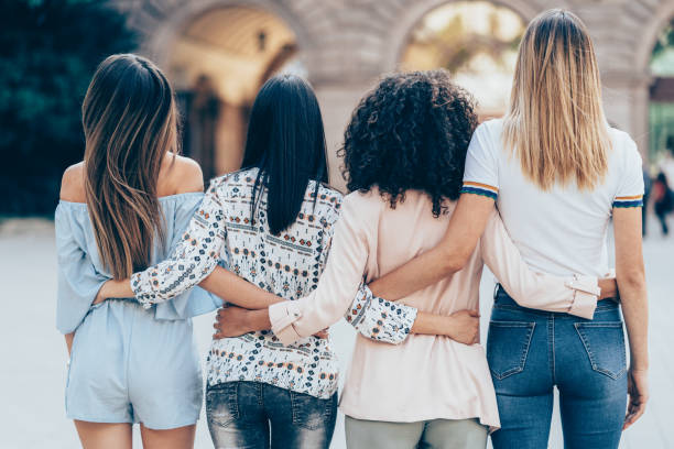 istock Group of friends holding together 1024322098