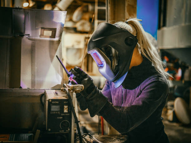 istock Female TIG Welder 1024322118