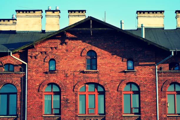 istock Revitalized red brick buildings. Retro colors stylization 1024342934