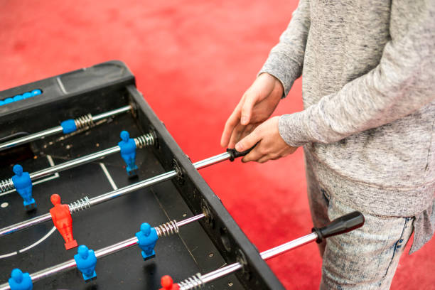 istock close up table soccer foosball with defocused background. a having fun concept 1024355440