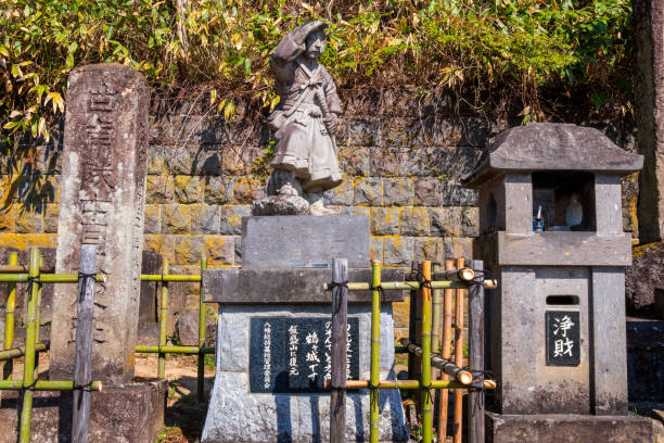 The grave site of Byakkutai (White Tiger Force) at Mt. Iimori in Aizuwakamatsu, Japan Aizuwakamatsu, Japan - April 21 2018: The grave site of Byakkutai (White Tiger Force) at Mt. Iimori, young teenage samurai who fought and committed suicide in the Boshin war harakiri photos stock pictures, royalty-free photos & images