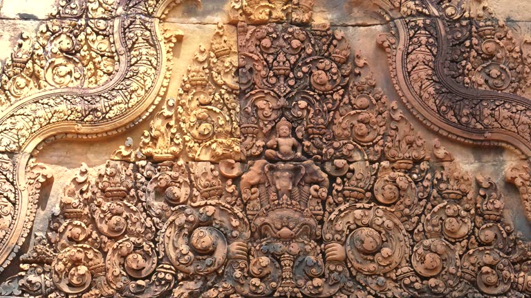 pan of a decorative pediment at banteay srei temple in angkor region