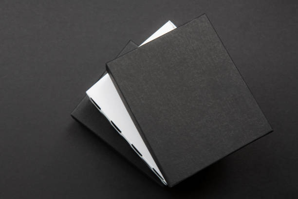 istock Black and white polka dot gift box on a dark contrasted background, creating a romantic atmosphere. Typically used for birthday, anniversary presents, gift cards, post cards. 1024514130