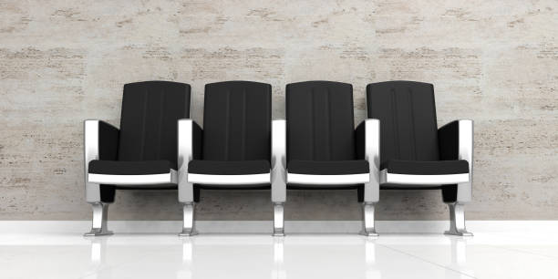 istock Waiting room. Empty black chairs on white floor. 3d illustration 1024534912