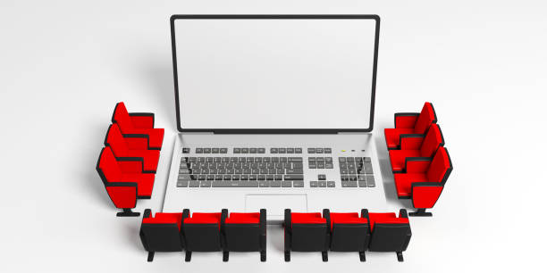 istock Cinema chairs around a laptop, blank white screen for copyspace, white background. 3d illustration 1024534926