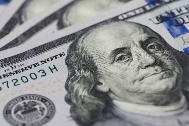 istock US dollar close up. Macro shot of a 100 dollar. 1024539928