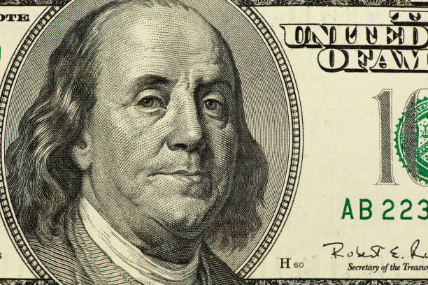 istock US dollar close up. Macro shot of a 100 dollar. 1024540270