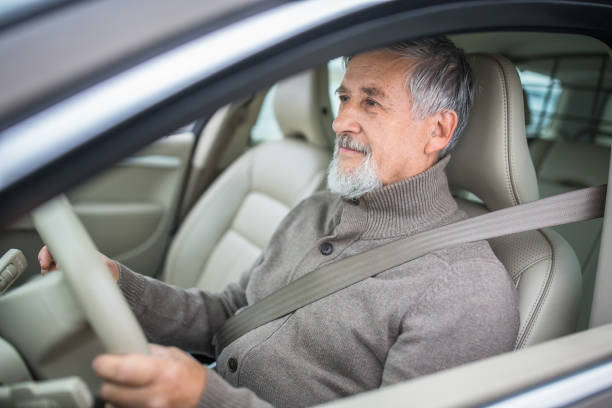 istock Senior man driving his modern car 1024545602