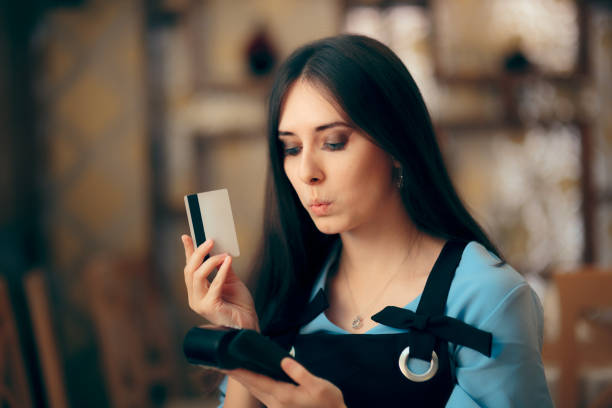 istock Woman Paying with Credit Card by Paying POS Terminal 1024549054