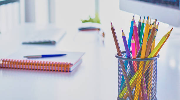 istock Graphite pencils in a metal grid-container on the office table. 1024551876