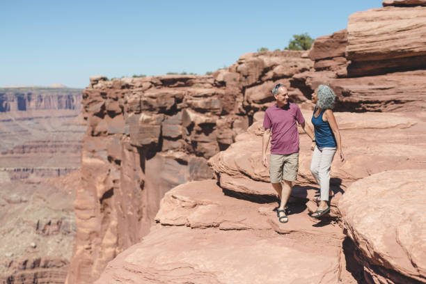 istock Senior couple hiking in Utah desert 1024557926