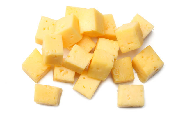 istock piece of cheese isolated on white background. top view 1024563862