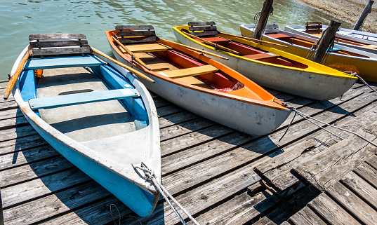 old rowboats at a jetty