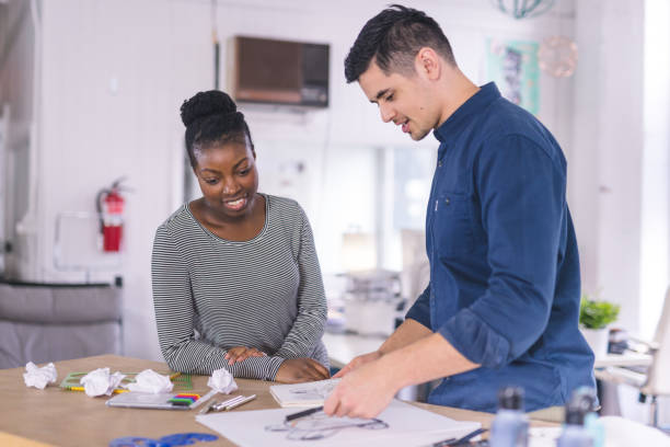 istock Design partners strategize in their modern studio 1024574008