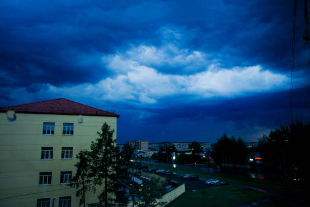 istock storm clouds over the city, bad weather, storm, thunderstorm 1024576712