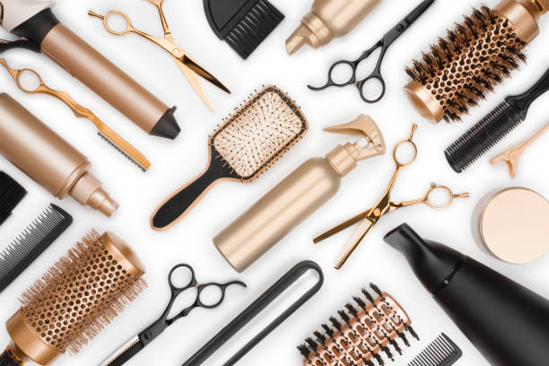 Full frame of professional hair dresser tools on white background stock photo