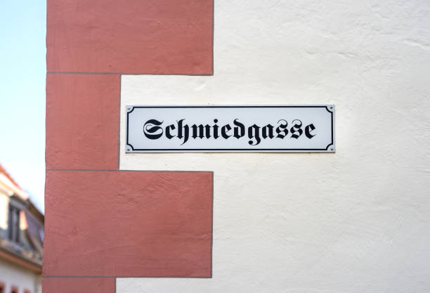 istock The German word for BLACKSMITH'S ALLEY hanging on a wall 1024579584