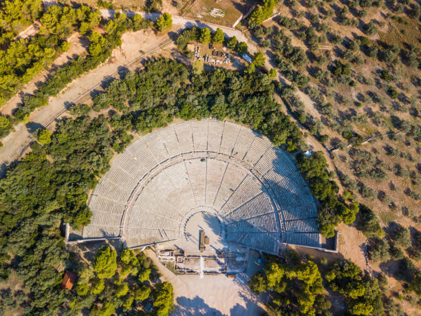 ancient amphitheater of epidaurus at peloponnese, greece. aerial drone photo - greek revival style imagens e fotografias de stock