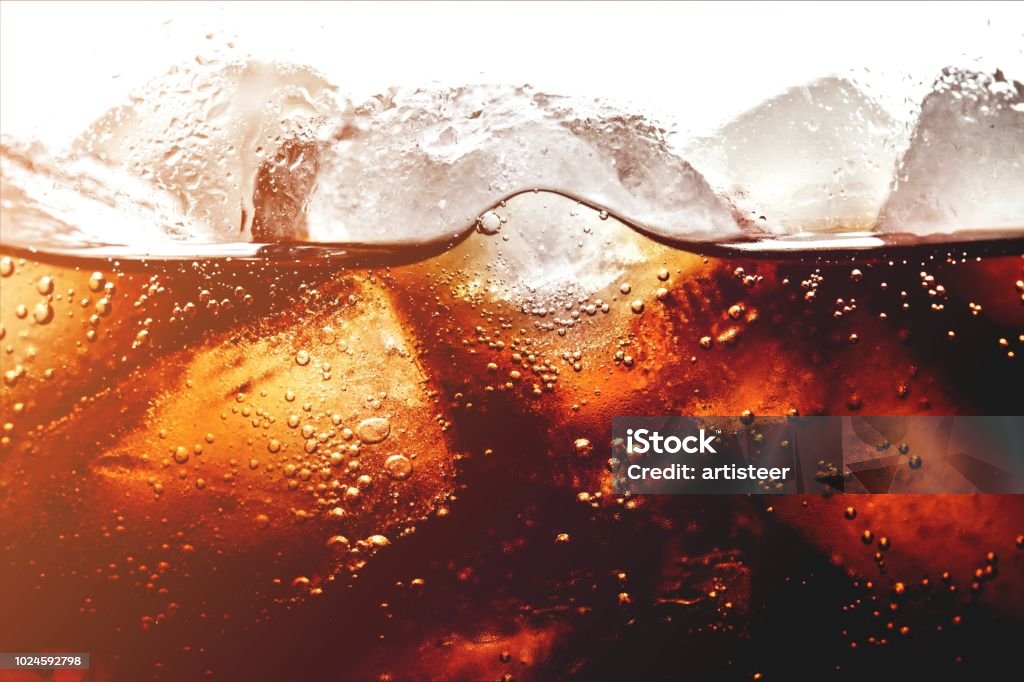 Soda. Ice cubes in cola beverage, close up Cola Stock Photo