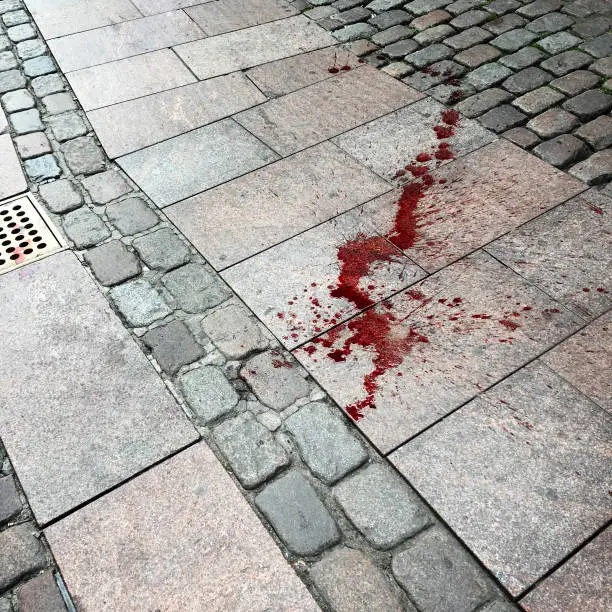 Photo of Blood spattered street