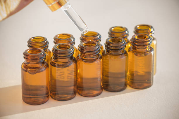istock Pipette in hand with small test tubes 1024607930