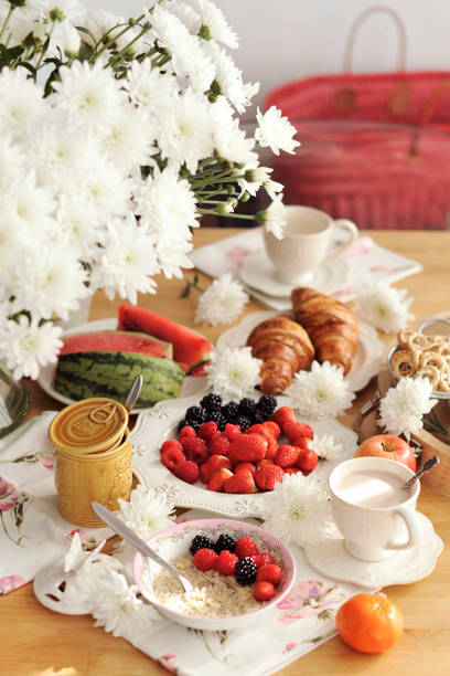 istock table with breakfast. served table. berries and pastries for breakfast 1024612592