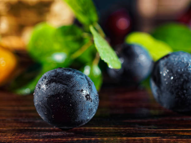 istock Red, yellow and blue plums 1024613468