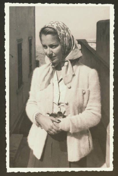 1955 Beautiful young woman with scarf
