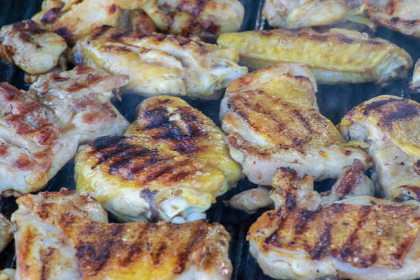 istock Chicken wings on grill 1024626966