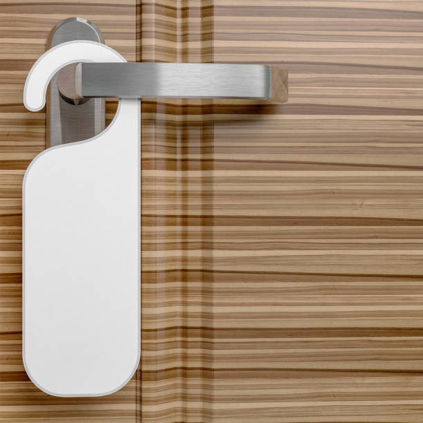 istock hotel door with paper label 1024630060
