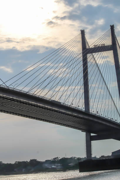 second howrah bridge - the historic cantilever bridge on the river ganges. - vertical lift bridge imagens e fotografias de stock